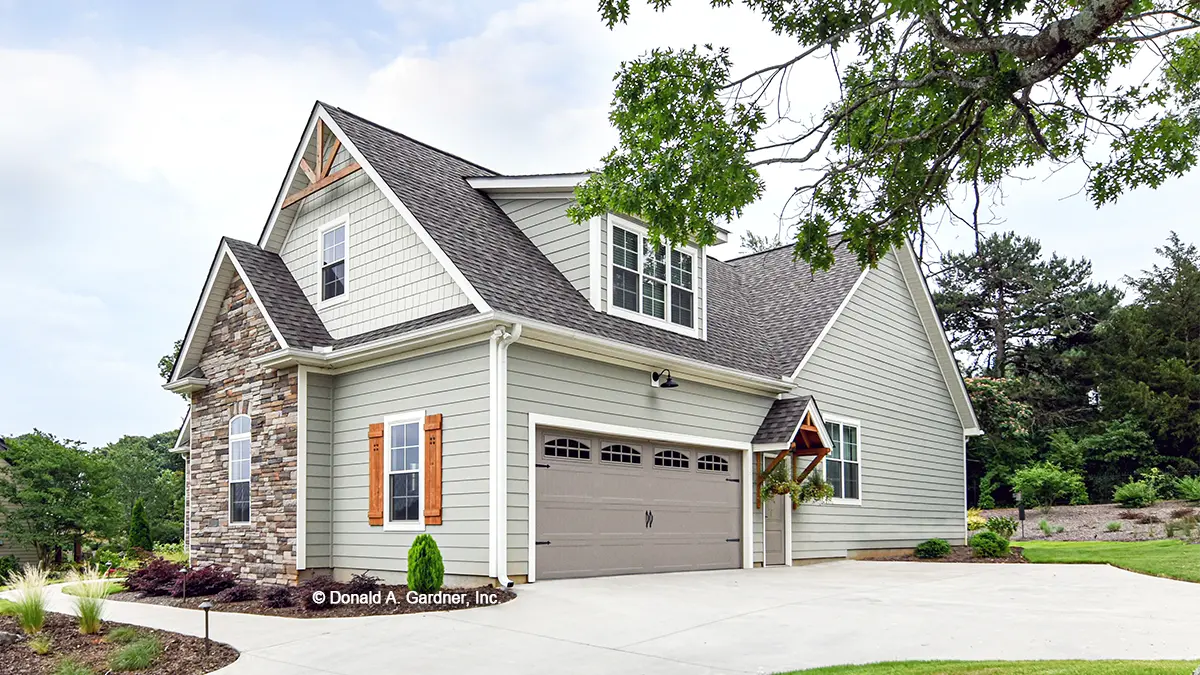 Side garage view photograph. The Mayfair plan 1317.