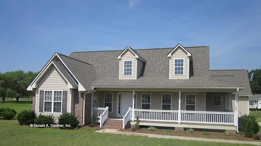 This is a photograph of the front of small house plan 266 The Meadowview as built by a customer