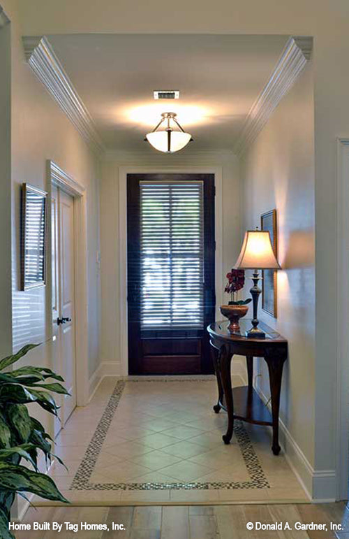 Crown molding along the ceiling in the foyer. The Merrill plan 1209