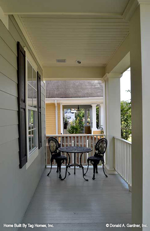 Covered front porch with seating. The Merrill plan 1209