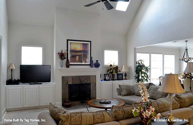 Built in cabinets on either side of the fireplace. The Merrill plan 1209