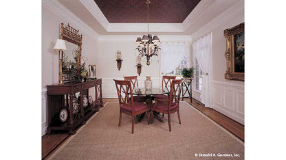 Tray ceiling and chandelier in the dining room. The Milford plan 331. 