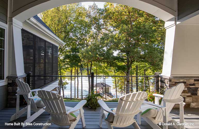 Rear porch view overlooking water.