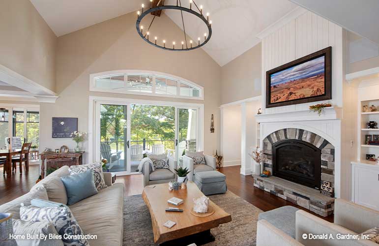 Cozy fireplace view and open patio doors leading out to the view. 