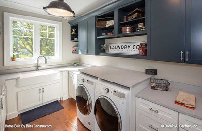 Perfect mud room, nice and open from the sink and washer and dryer. 