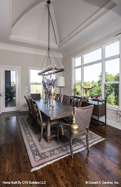 Well-lit dining room with oversized window. The Monarch Manor plan 5040.