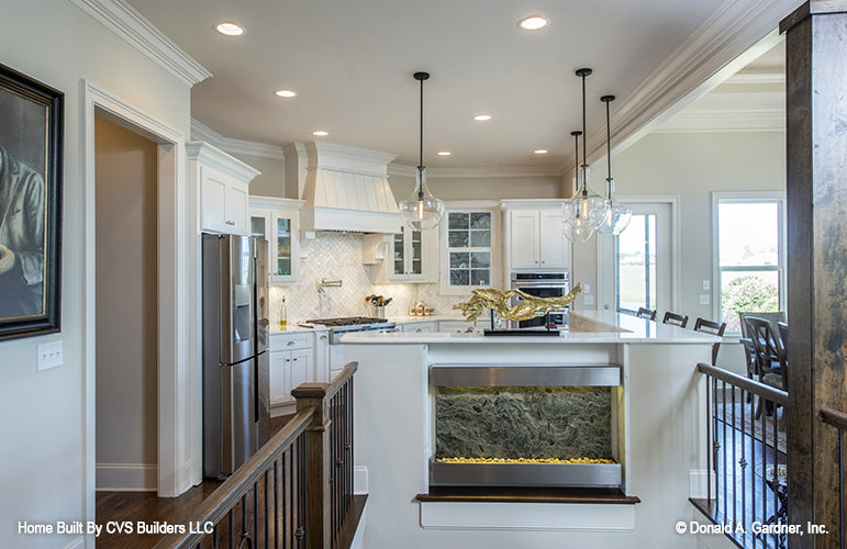 Recessed lighting in the kitchen. The Monarch Manor plan 5040.