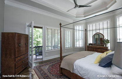 Open patio door in the master bedroom. The Monarch Manor plan 5040.