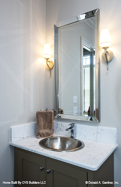 Single sink vanity in the bathroom. The Monarch Manor plan 5040.