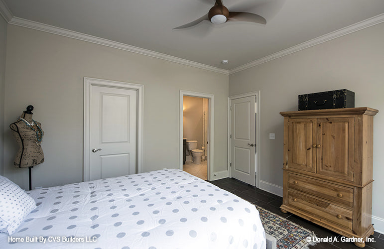 Crown molding along the ceiling int he bedroom. The Monarch Manor plan 5040.