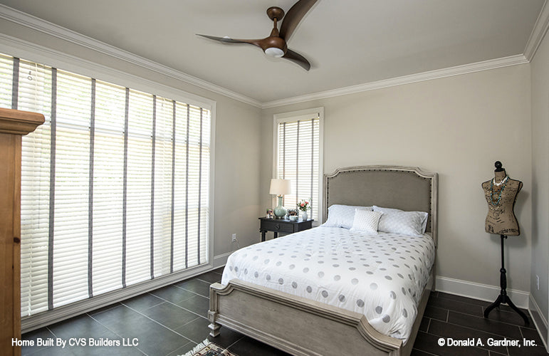 Large floor to ceiling window in the bedroom. The Monarch Manor plan 5040.