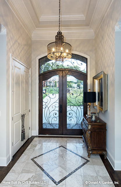 Tray ceiling in the foyer. The Monarch Manor plan 5040.