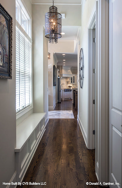 Window bench seating in the hallway. The Monarch Manor plan 5040.