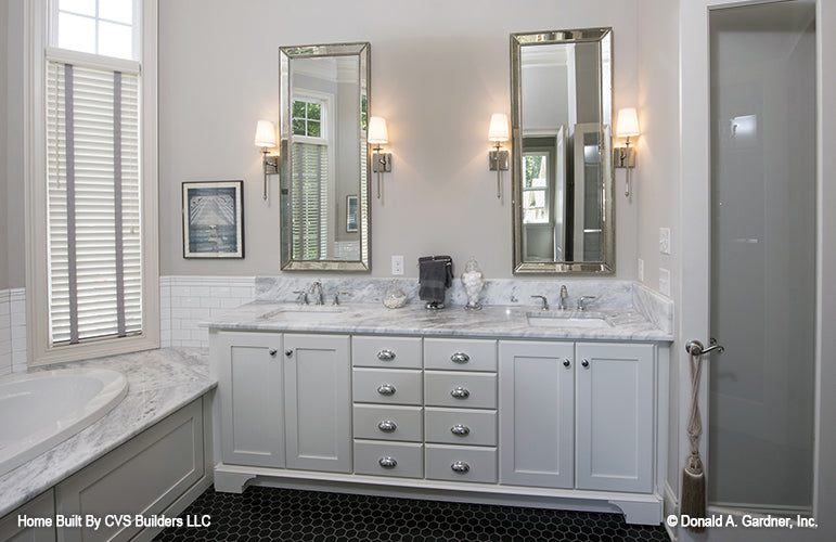 Double sink vanity in the master bathroom. The Monarch Manor plan 5040.