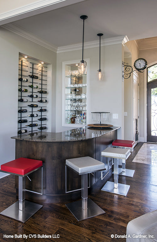 Wine rack and bar at the wet bar. The Monarch Manor plan 5040.