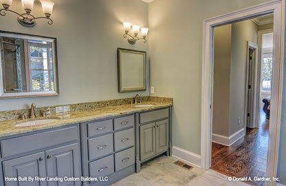 Double sink vanity in the master bathroom. The Newcastle plan 994.