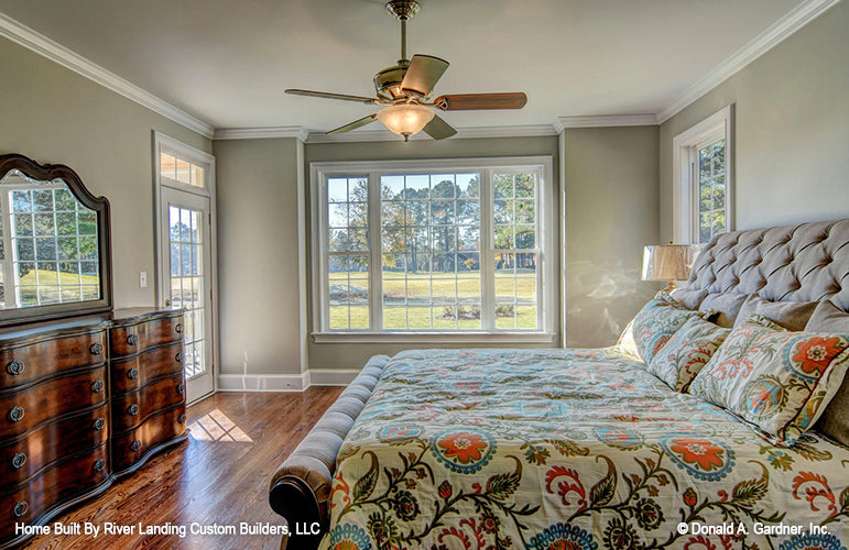 Crown molding along the ceiling and windows in the master bedroom. The Newcastle plan 994.