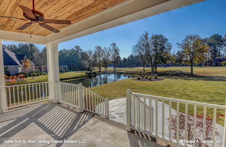 Covered rear porch with ceiling fan. The Newcastle plan 994.