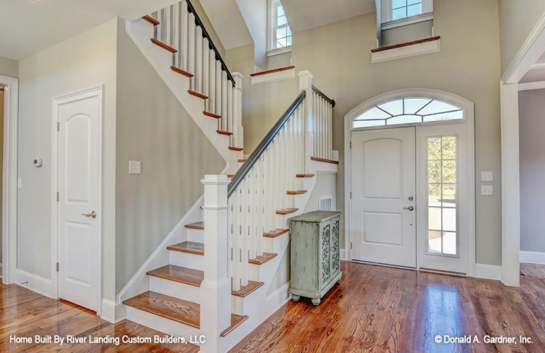 Arched window above the entry door in the foyer. The Newcastle plan 994.