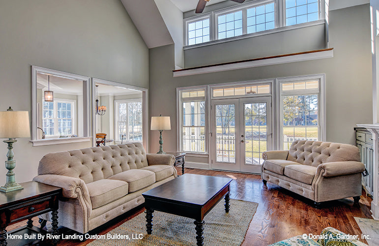 Double glass patio doors and large windows in the great room. The Newcastle plan 994.