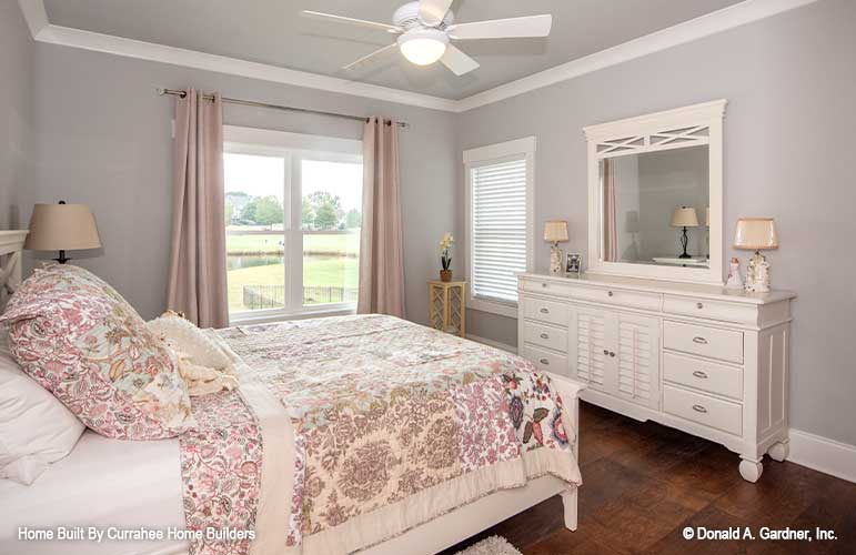 Crown molding along the ceiling in the secondary bedroom. The Nicholette plan 1520.