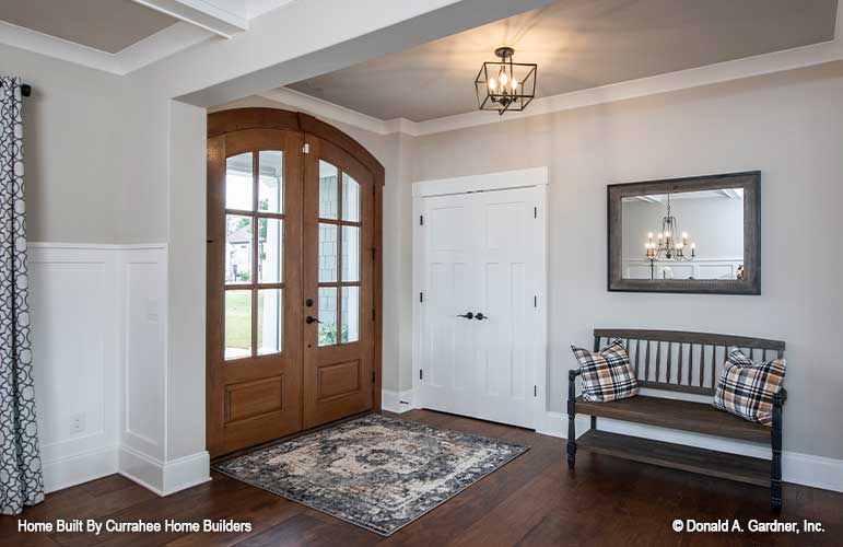 Arched double entry doors in the foyer. The Nicholette plan 1520.