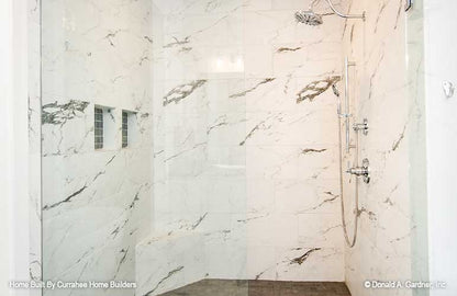 Tiled walk-in shower in the master bathroom. The Nicholette plan 1520.