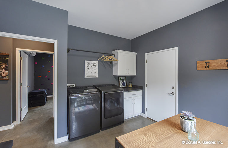 This is a picture of the utility room laundry area of contemporary house plan 209 The Northwood as built by a customer