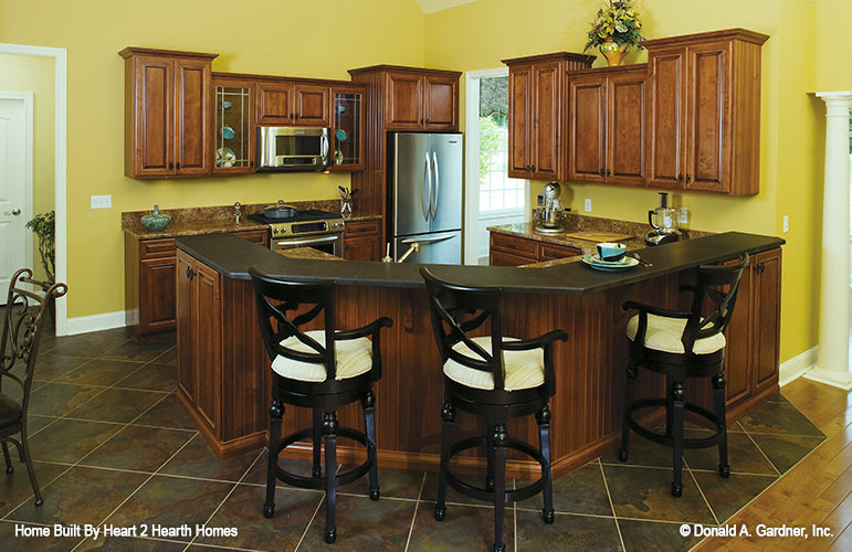 Kitchen with island pictured of house plan 759 The Northwyke