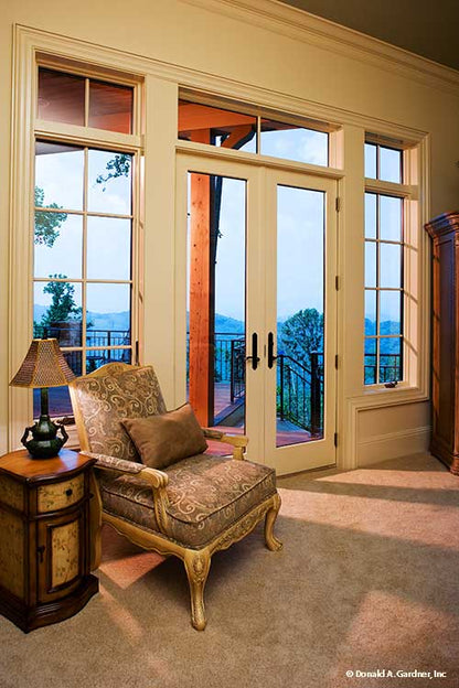 French patio doors to the rear porch. The Oak Abbey plan 5003.