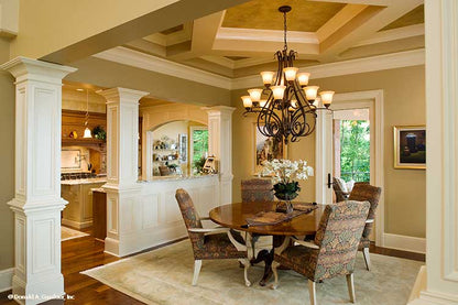 Large chandelier in the dining room. The Oak Abbey plan 5003.