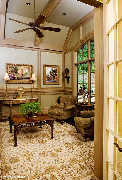 Wood trim accents in the study. The Oak Abbey plan 5003.