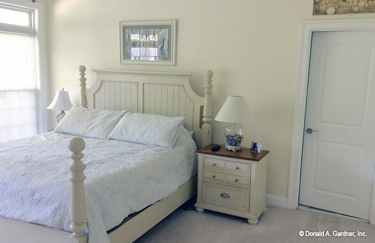 Cream walls in the master bedroom. The Oakmont plan 318.