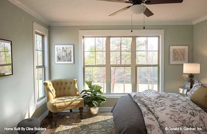 Master bedroom with natural light from the large windows pictured for plan 1428 The Oscar