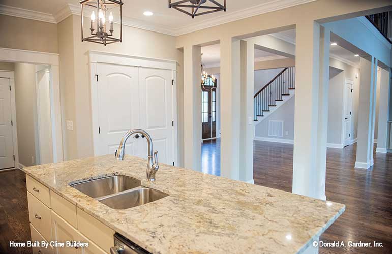 Open floor plan for plan 1428 The Oscar shows kitchen view to foyer and great room 