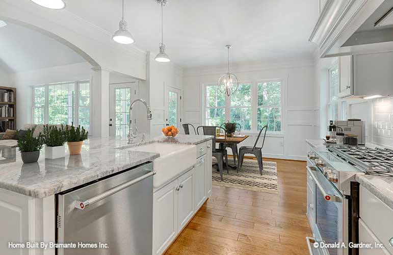 Picture of kitchen island and breakfast nook open to great room for plan 1465 The Oxley