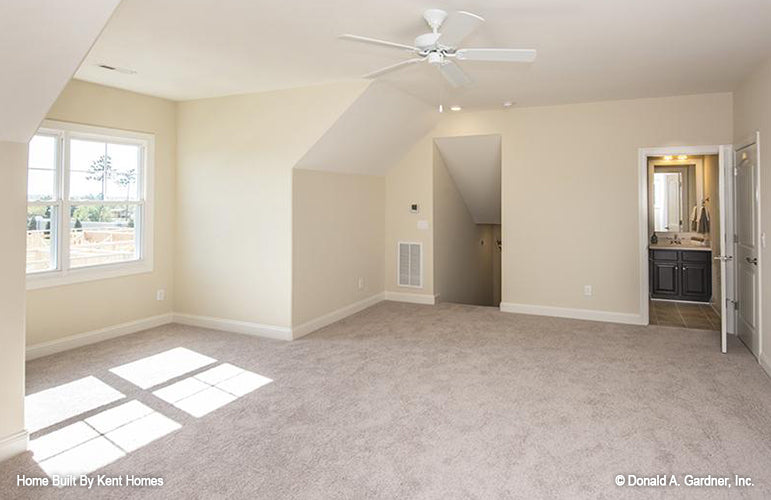 Double window and bathroom in the bonus room. The Padgett plan 1124.