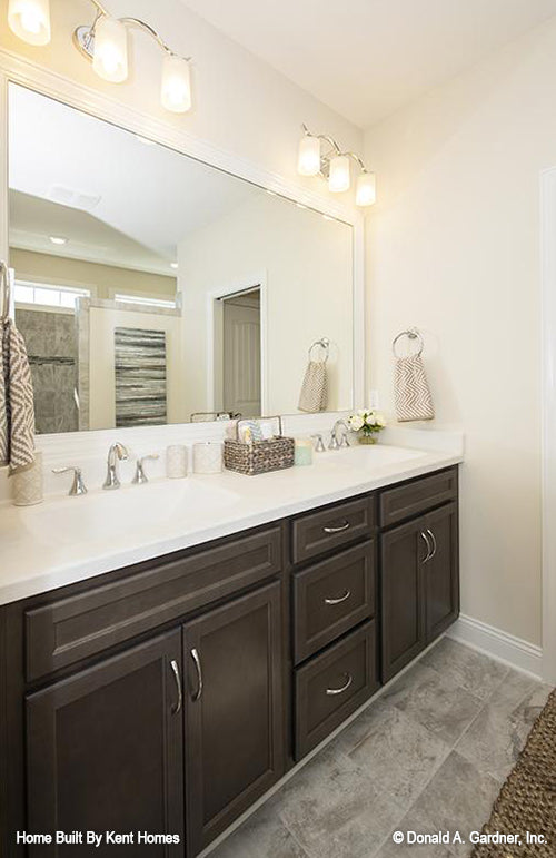 Double sink vanity in the master bathroom. The Padgett plan 1124.