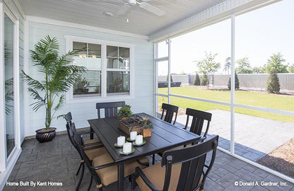 Ceiling fan in the screened in porch. The Padgett plan 1124.