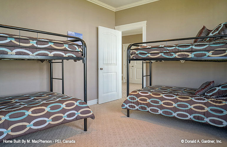 Two sets of bunk beds in the bedroom. The Palm Lily plan 845. 