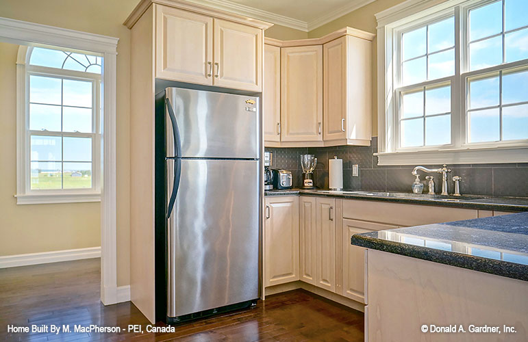 Double window behind the kitchen sink. The Palm Lily plan 845. 