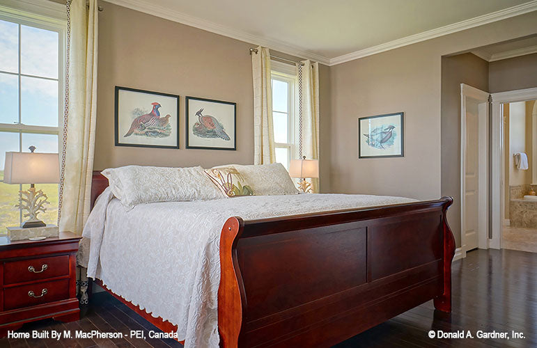 Crown molding along the ceiling in the master bedroom. The Palm Lily plan 845. 