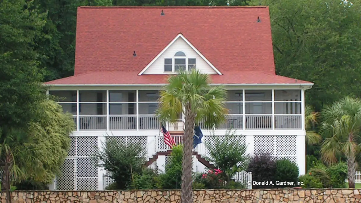 This is a photograph of the rear of beach house plan 737 The Palmetto as built by a customer