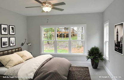 Well-lit master bedroom with flat ceiling. Paxton plan 1510