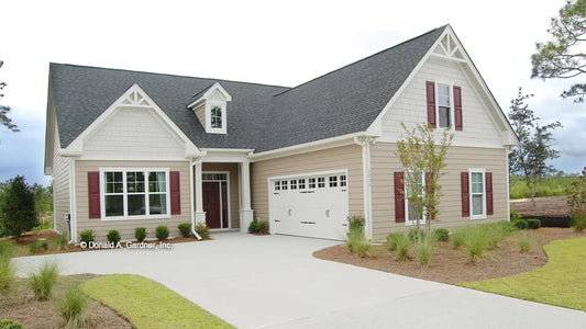 This is a photograph submitted by the customer. Front view with a courtyard garage. The Pemberton plan 972.