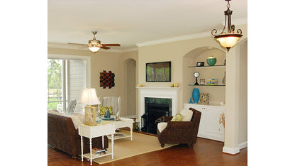 Built in shelves and fireplace in the great room. The Pemberton plan 972.