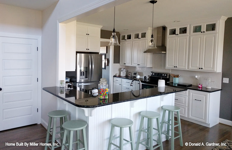 This is a photograph of the kitchen as built by a customer of brick house plan 1034 The Peppermill