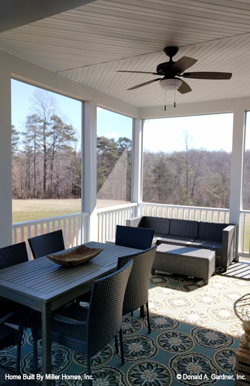 This is a photograph of the porch as built by a customer of brick house plan 1034 The Peppermill