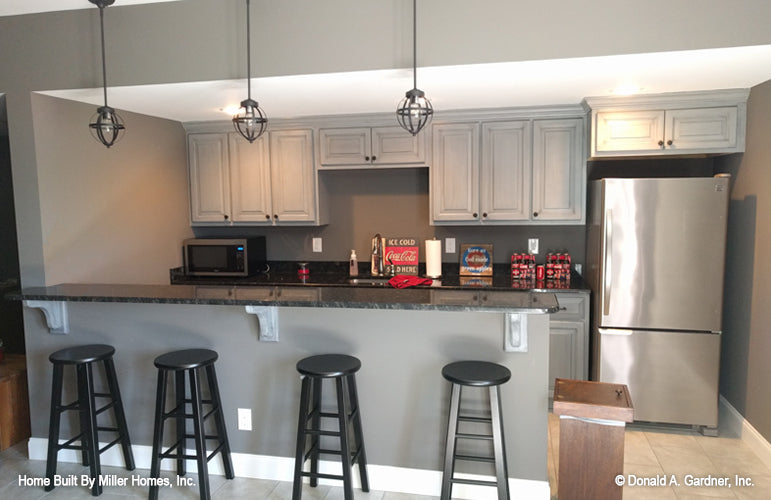 This is a photograph of the wet bar as built by a customer of brick house plan 1034 The Peppermill