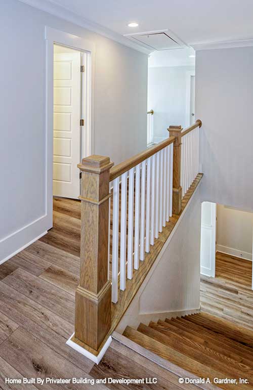 A view down the staircase and into the upstairs hallway. Percy plan 1503